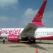 14 घंटे की फ्लाइट देरी, सिर्फ बर्गर-फ्रेंच फ्राई! SpiceJet को यात्री को देने होंगे 55,000 रुपए मुआवज़ा